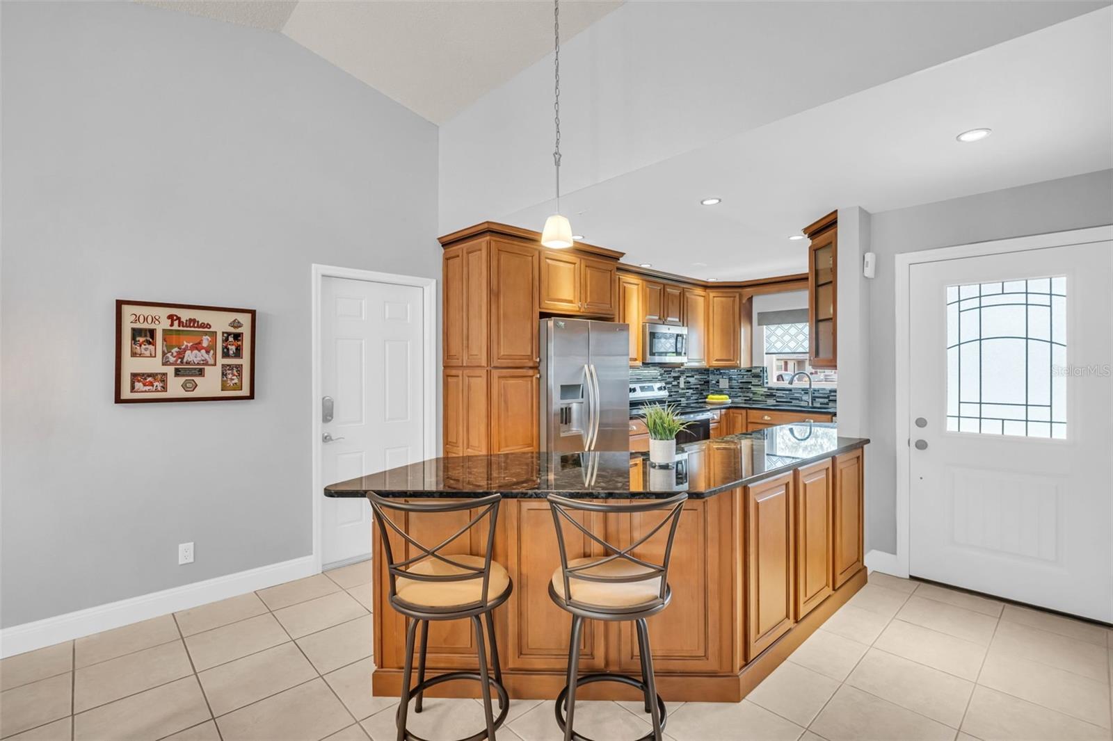 Newer glass front entry door & updated kitchen~