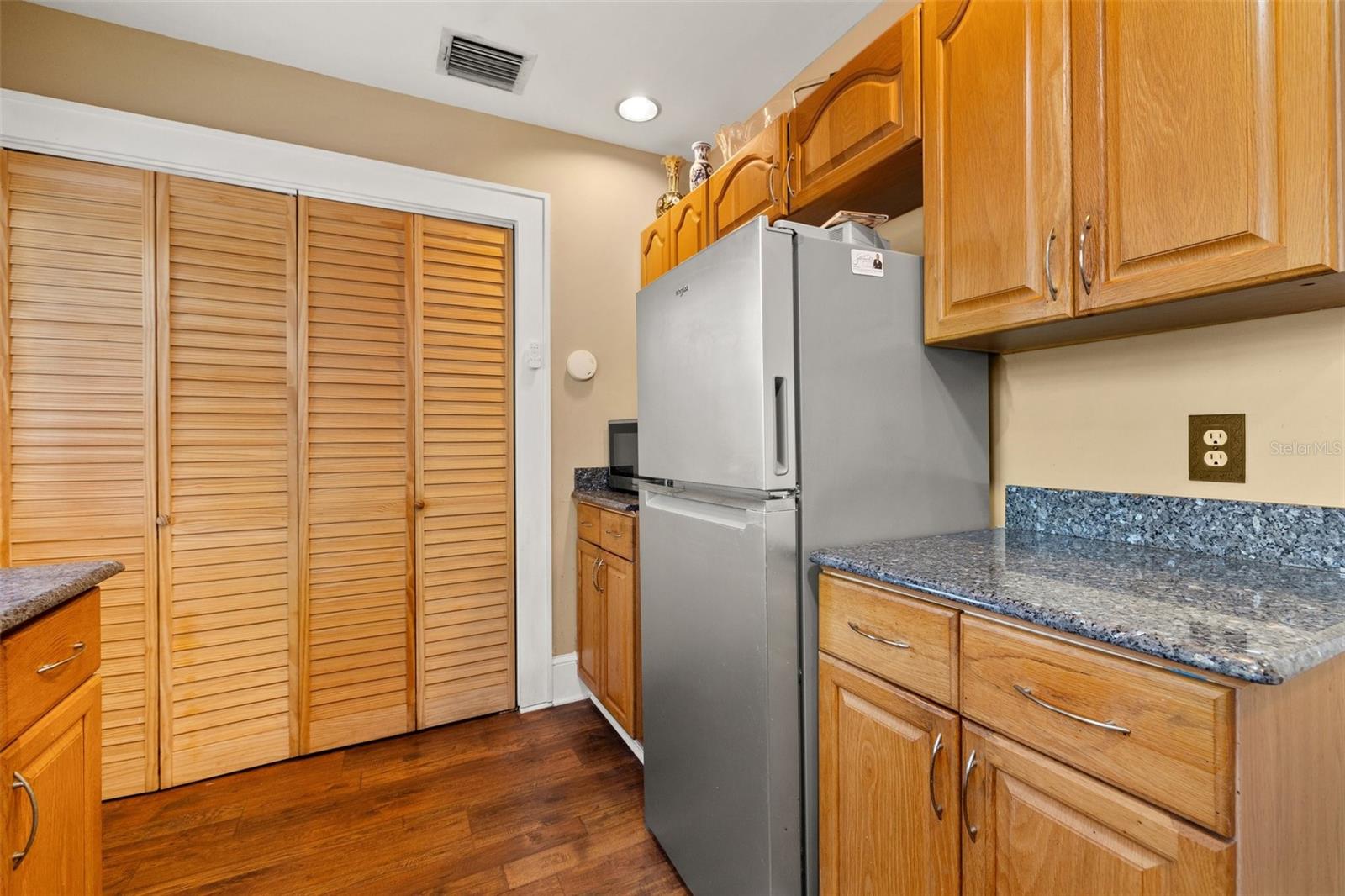 Kitchen also laundry behind louvered doors