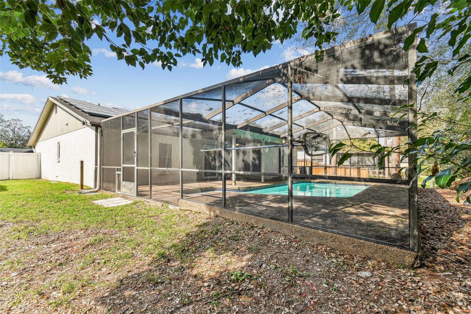 Side view of screened backyard area