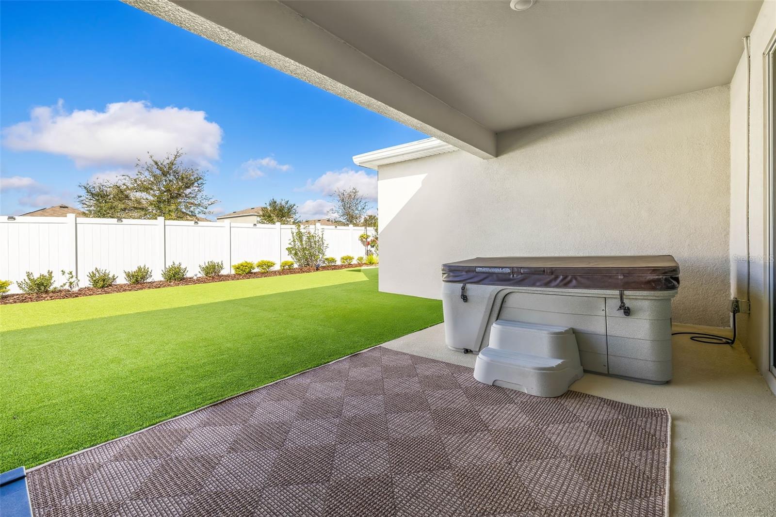 This fantastic lanai with hot tub is ready for you to hop in!