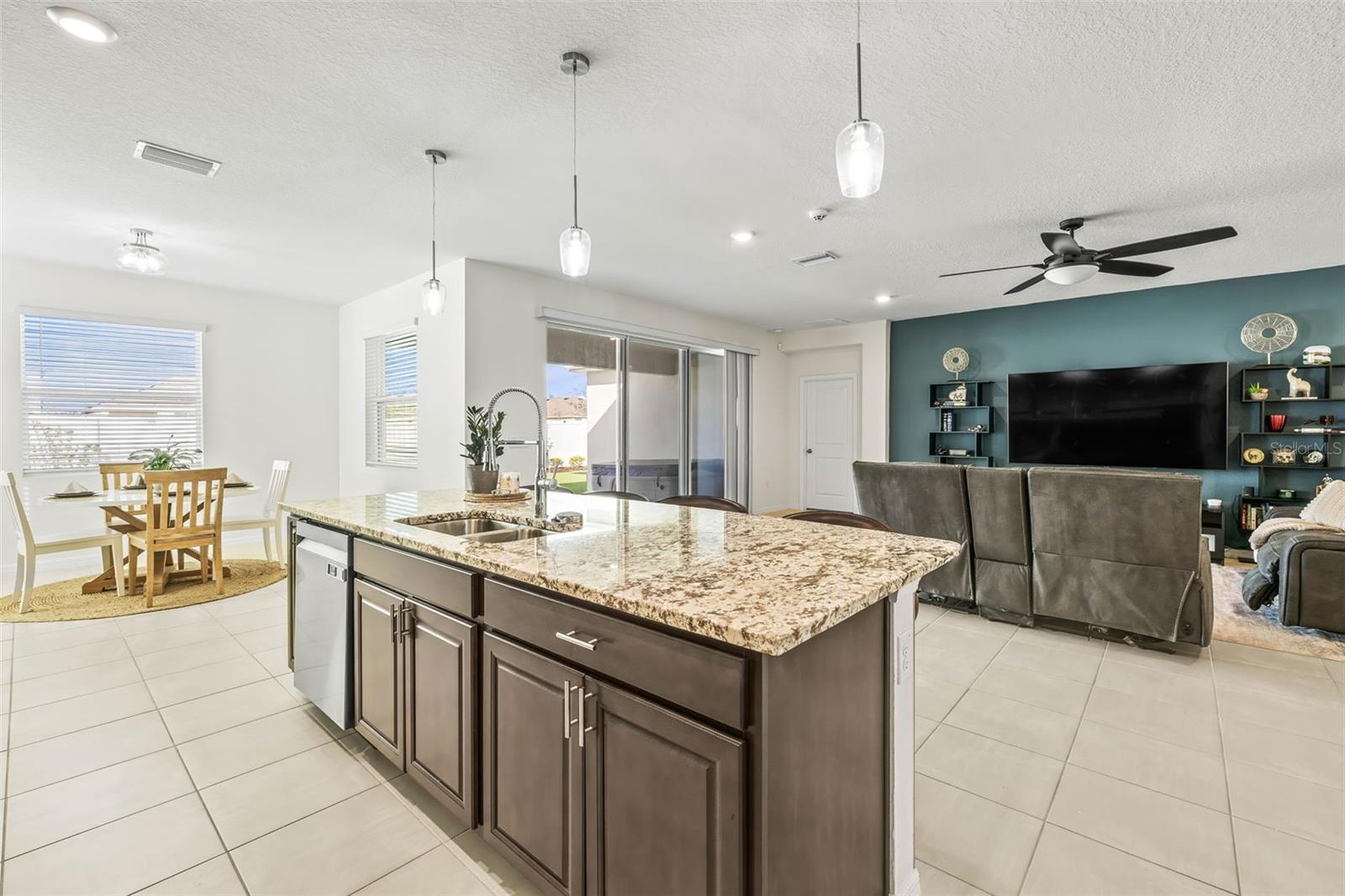 Stay connected in the kitchen to your family room or retreat to the dining area for formal seating.