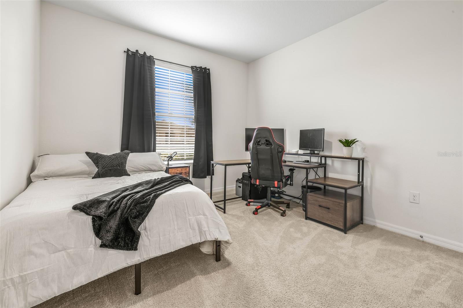 Bedroom 3 with full standard closet.