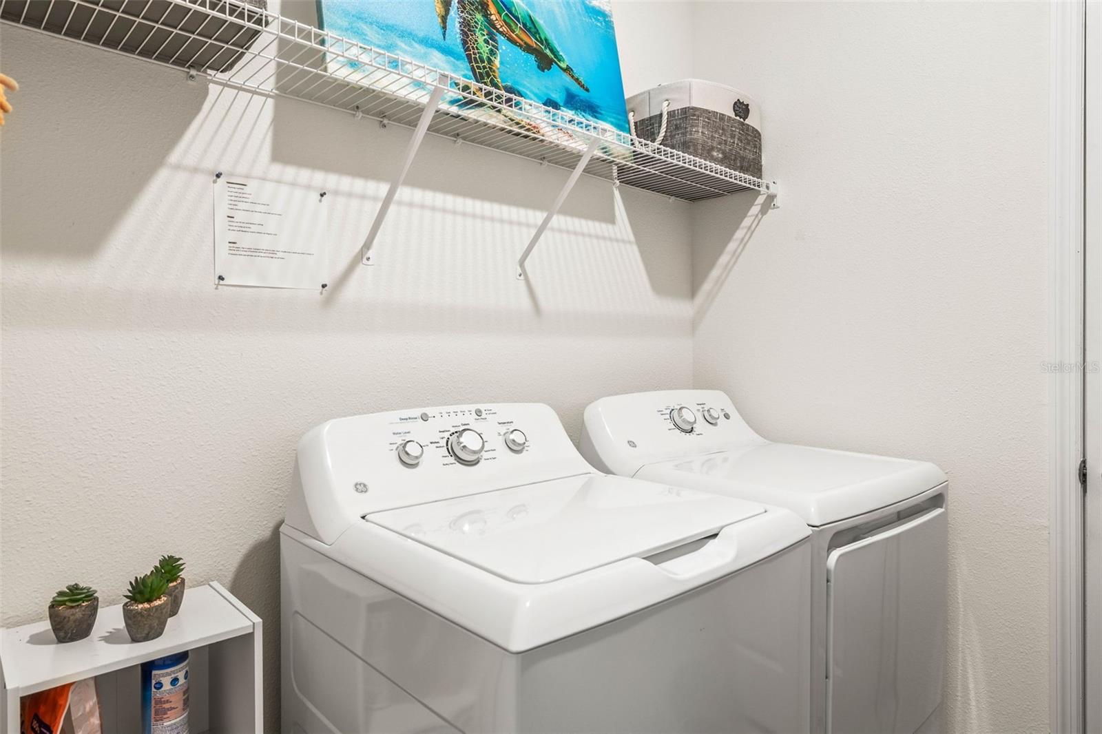 Laundry room with additional storage