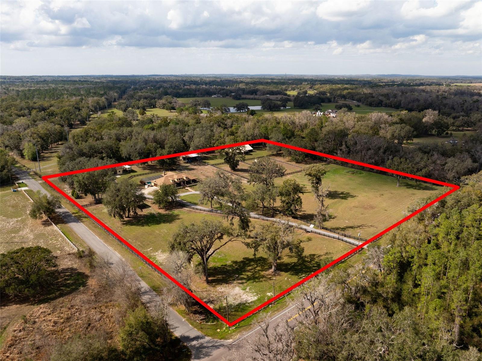 9.6 Acres, fully fenced, cross fenced. 2 gated entrances.