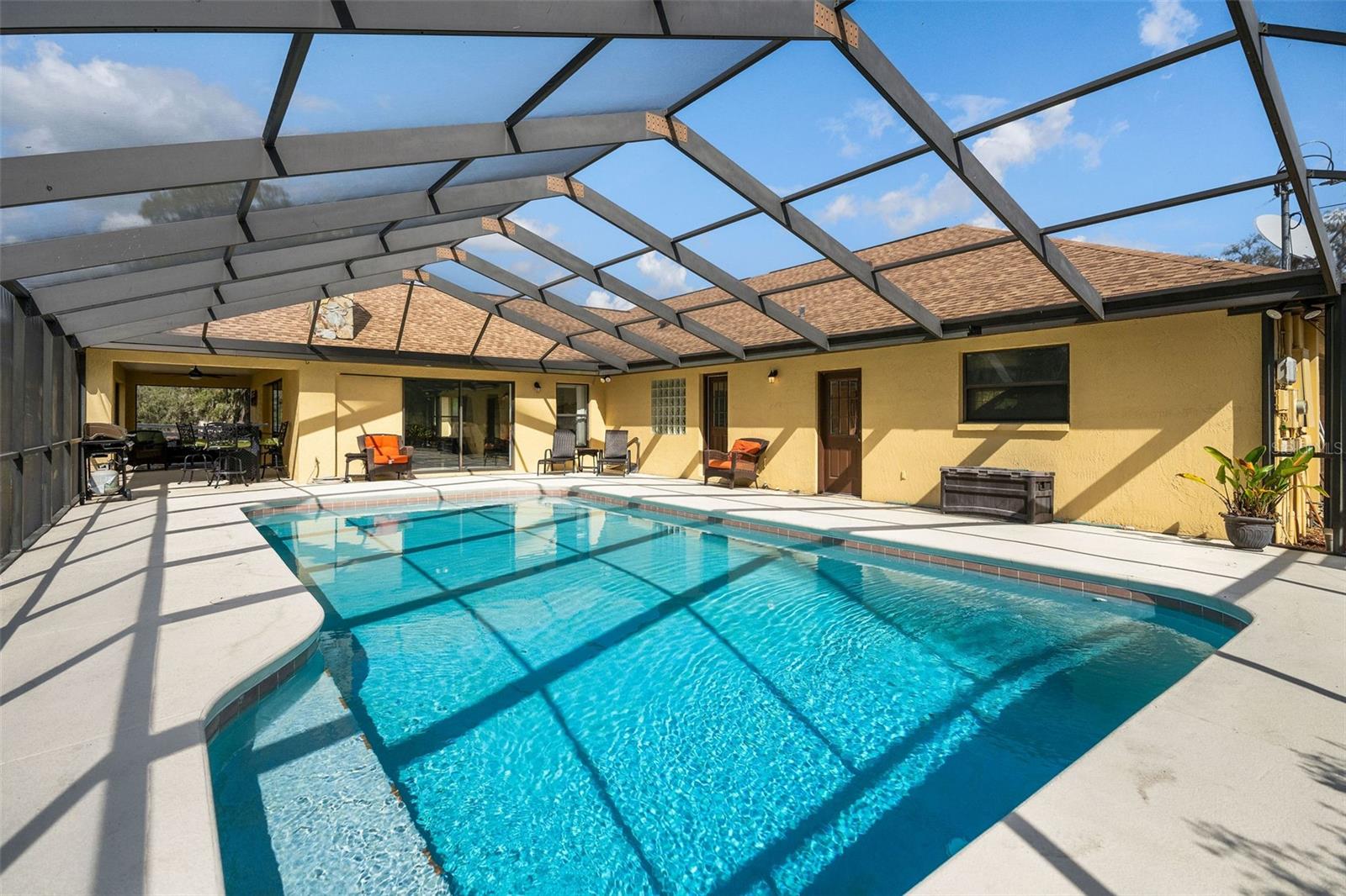 Large screened pool lanai with heated pool