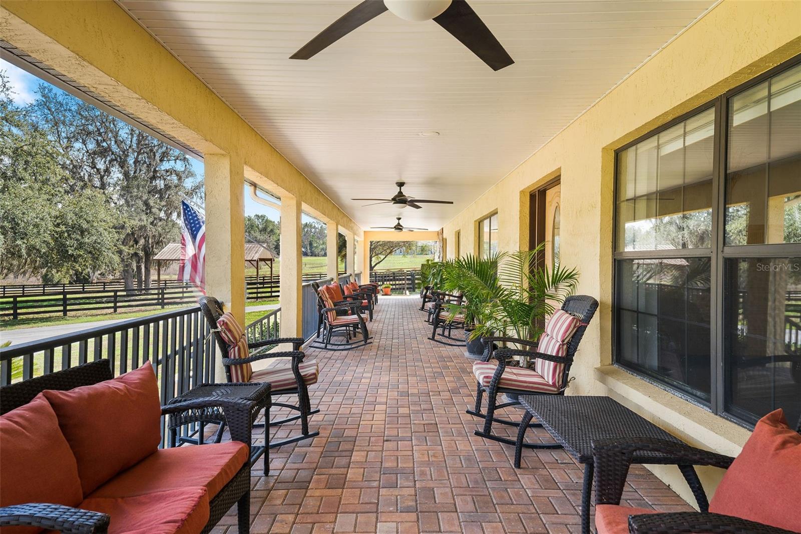 Expansive 86'x10 Front porch with pavers