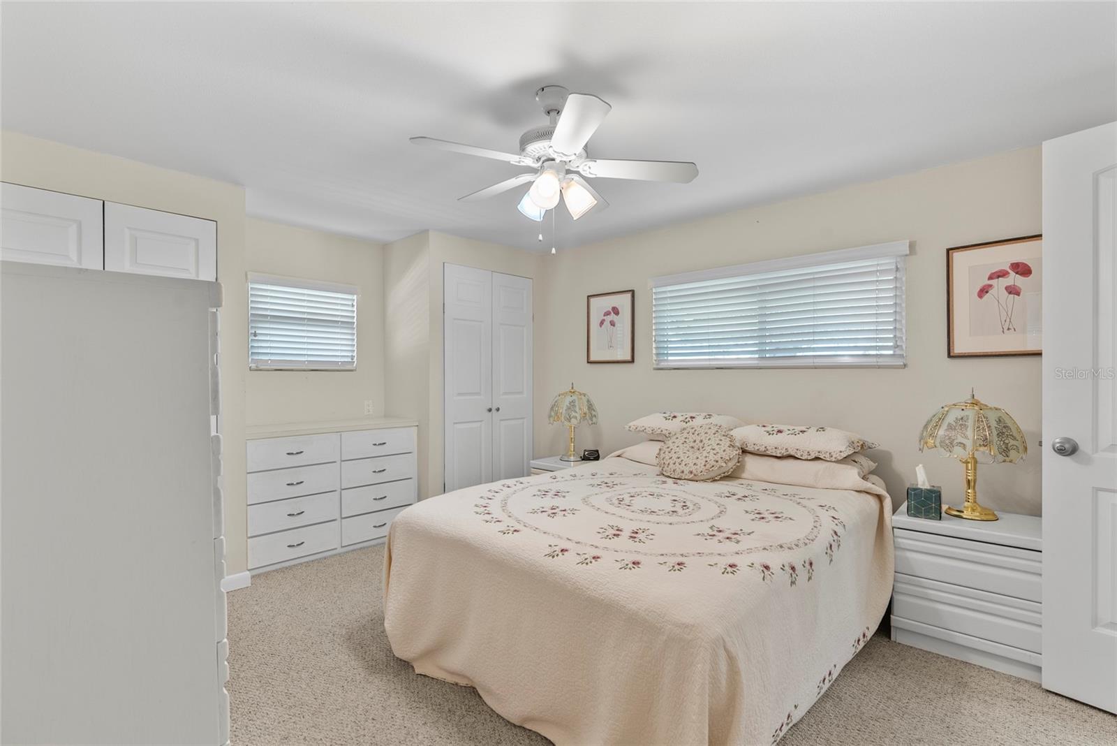 PRIMARY BEDROOM WITH BUILT IN DRESSER