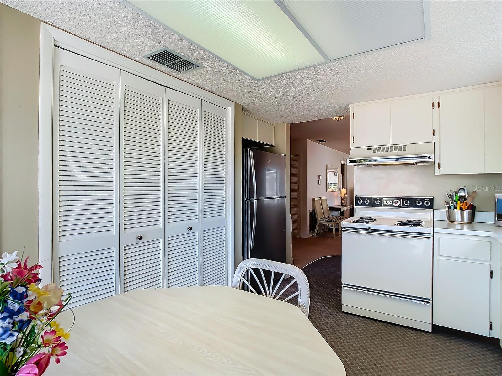 Washer and dryer behind closet doors