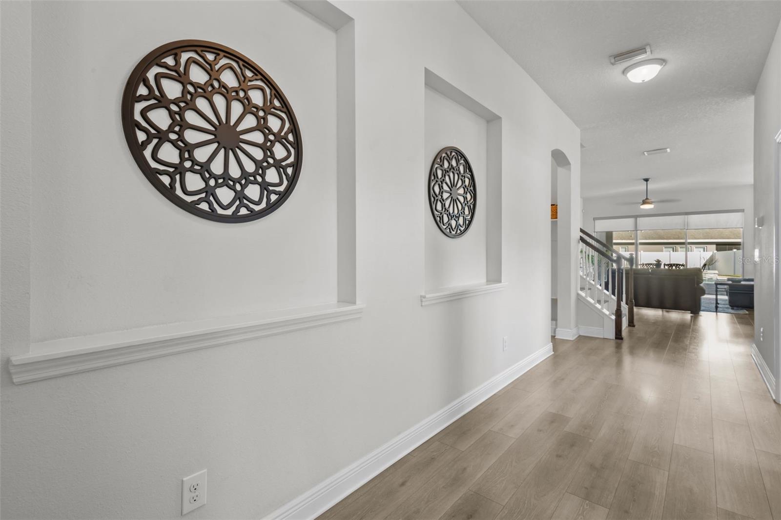 Entryway - first space when you walk in where you will notice the upgraded laminate floors