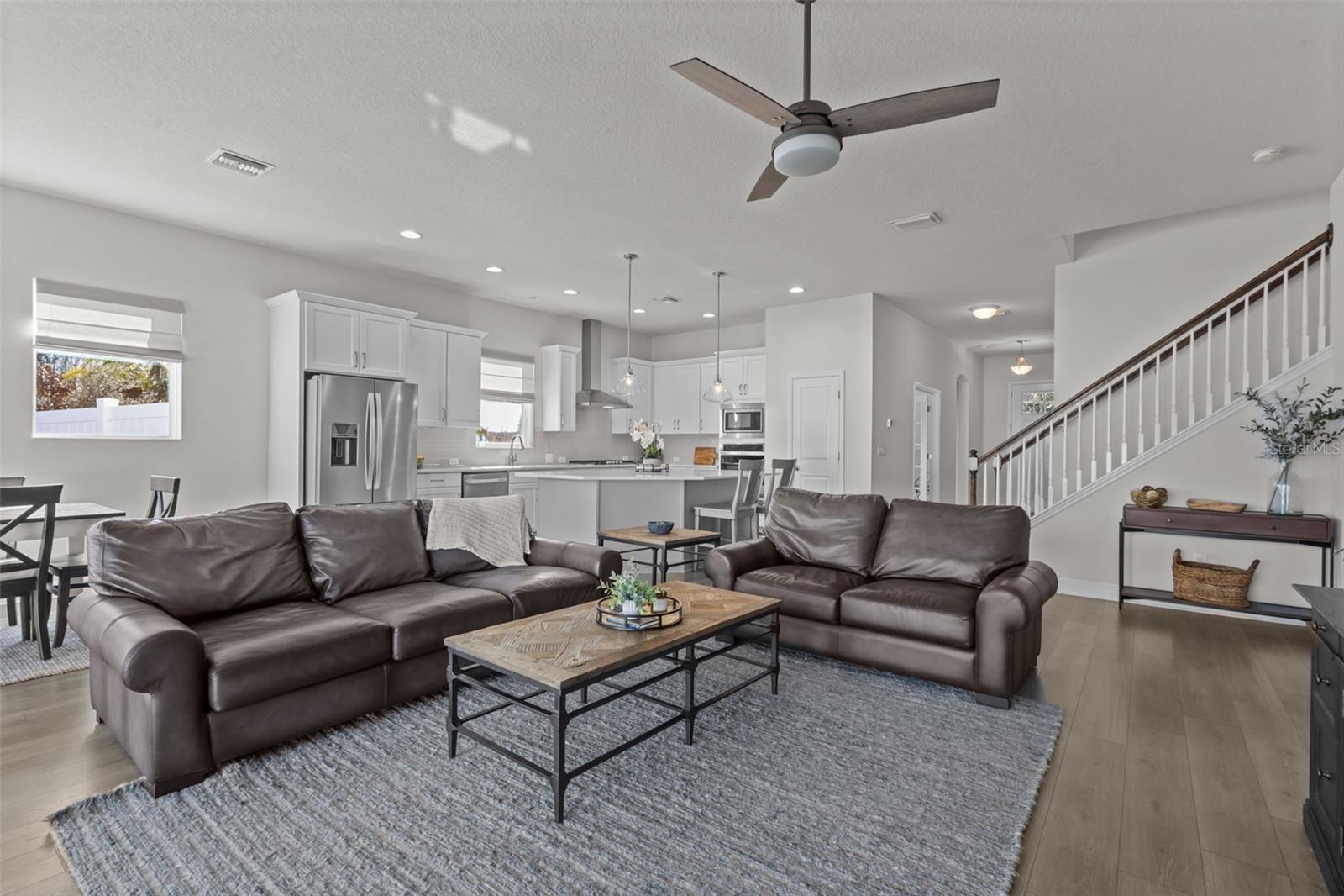 Living Room - upgraded laminate flooring throughout living spaces