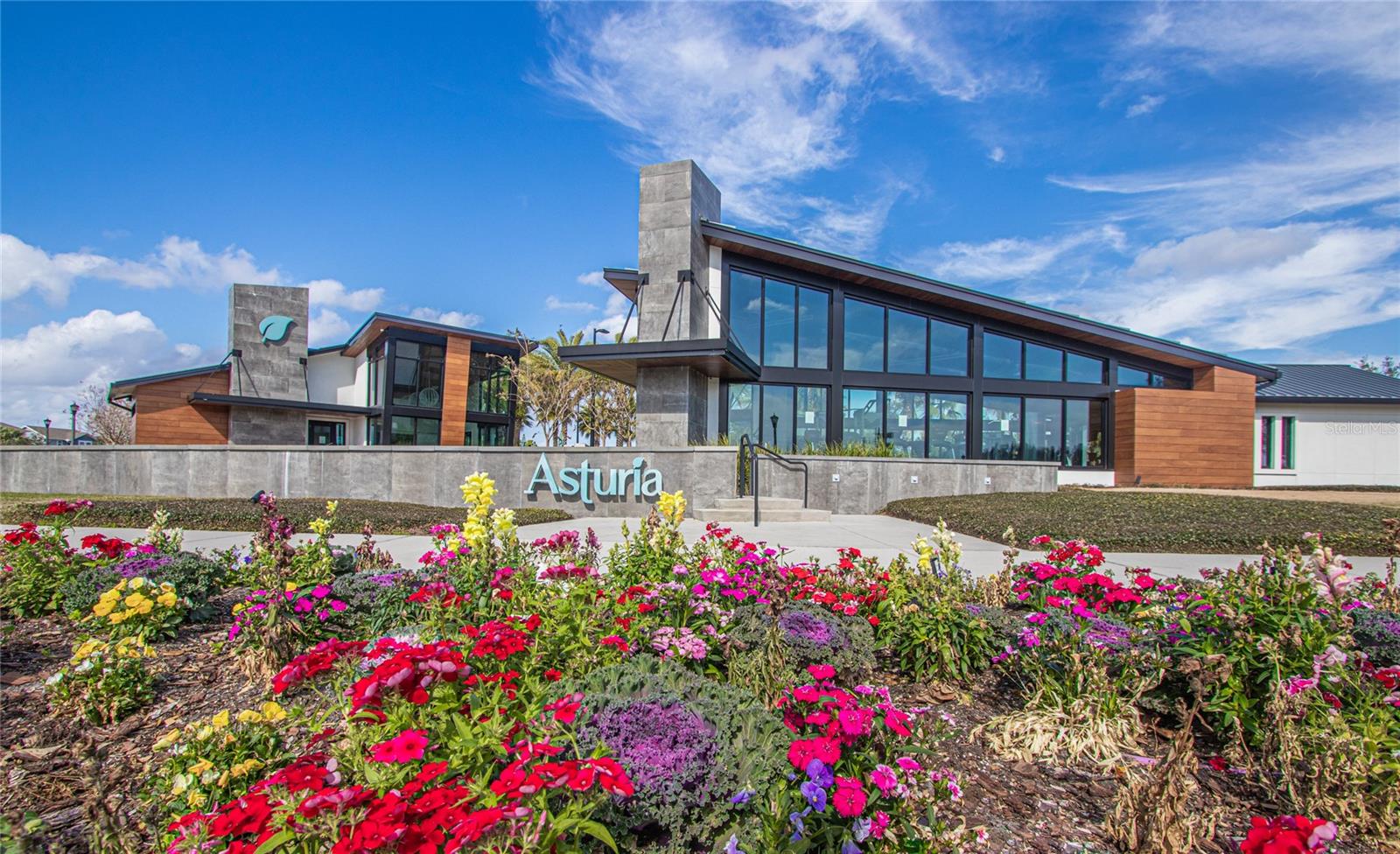 View of Amenity Center - right is the gym, left is clubhouse, pool is behind both