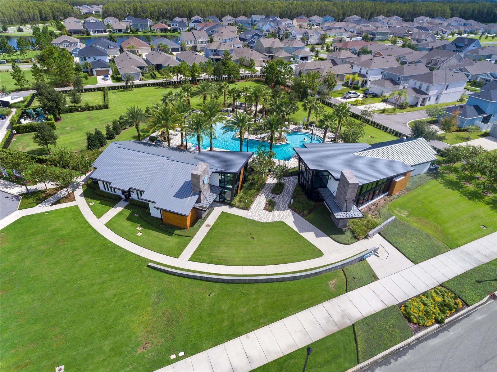 View of Amenity Center - right is the gym, left is clubhouse, pool is behind both