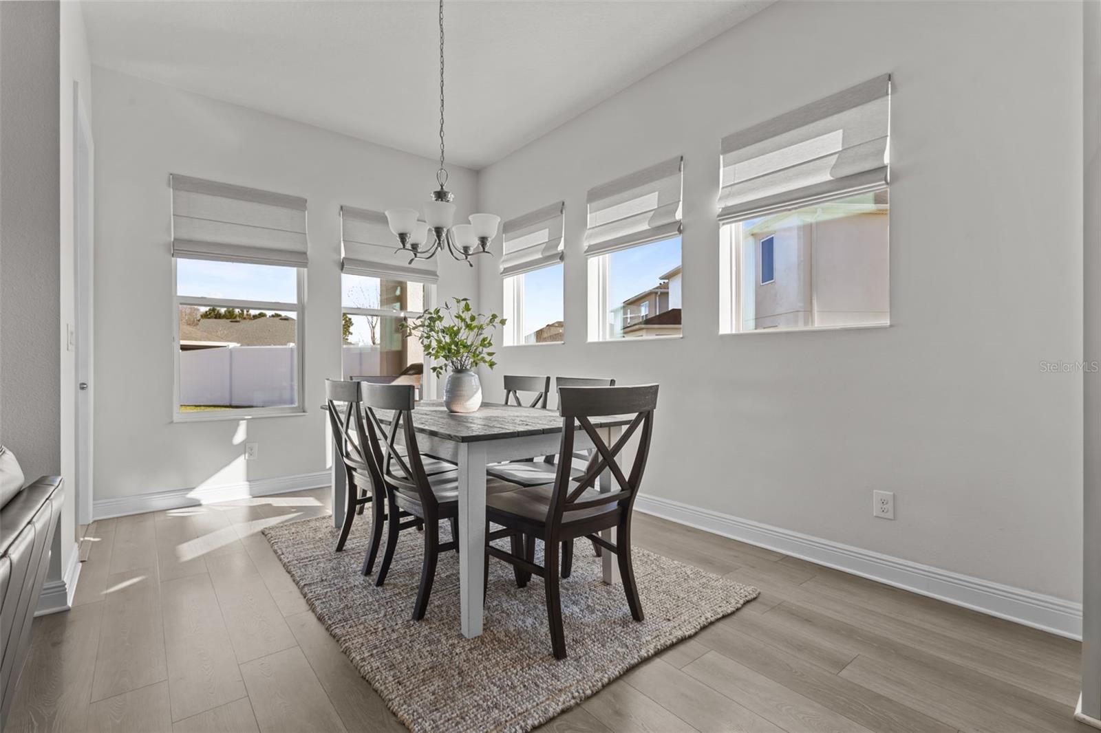 Dining Room - just off kitchen, the number of windows gives amazing light