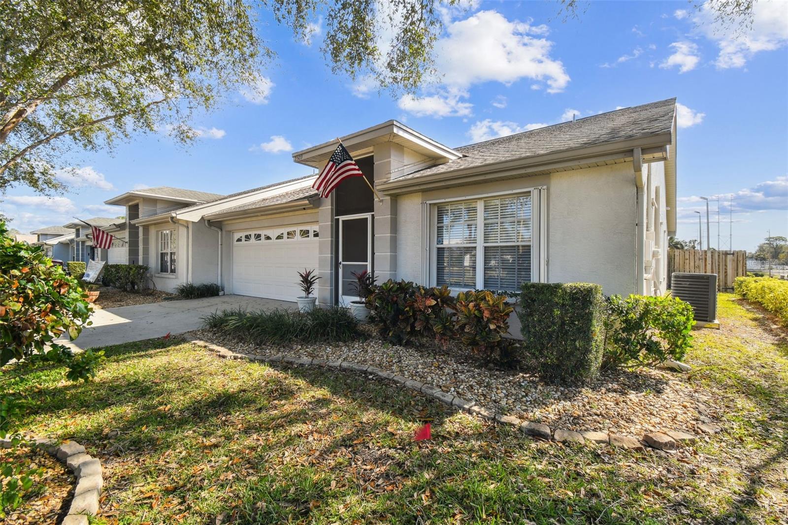 Gorgeous end unit with manicured landscaping