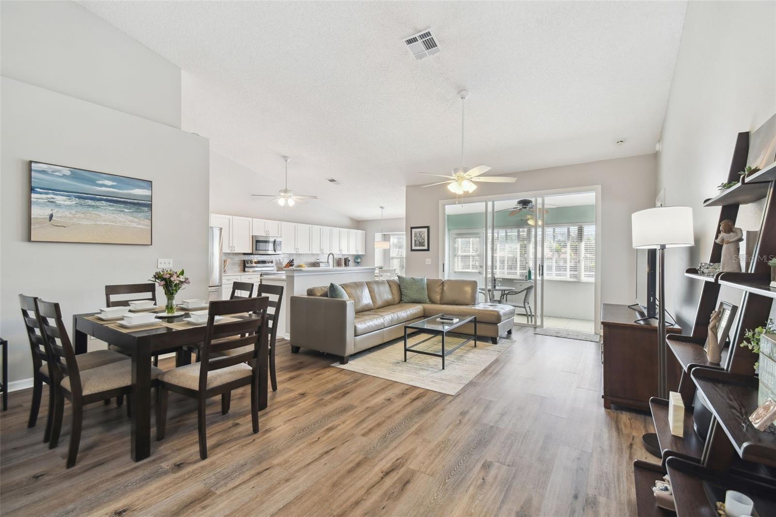 Living Room, Dining Room and Kitchen Combo for a beautiful open floor plan.