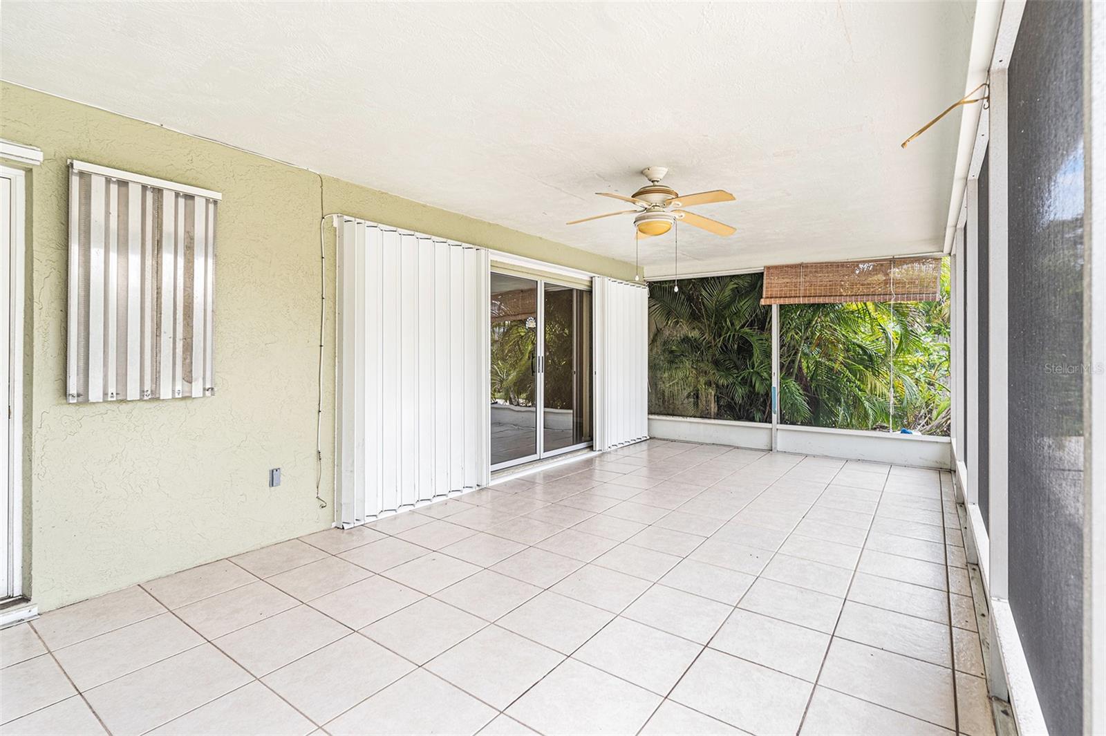 Screened lanai enclosure.