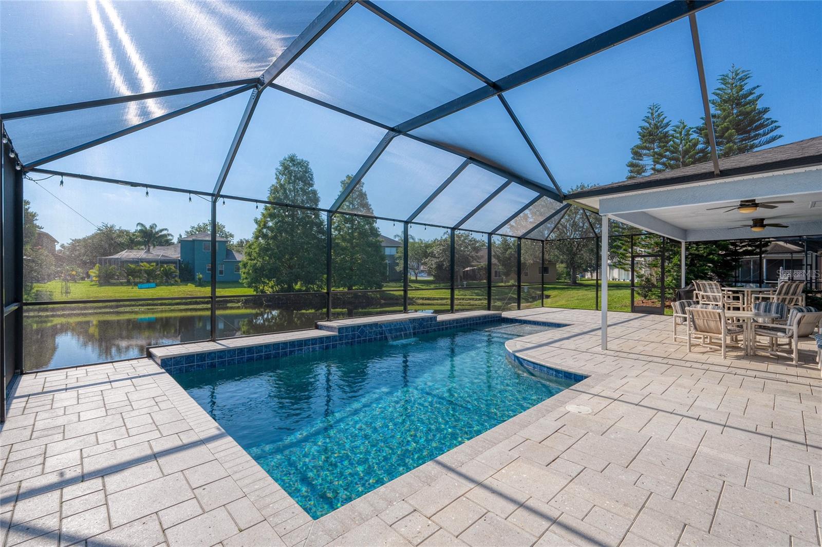 Pool cage built in 2020 with Shellock pavers