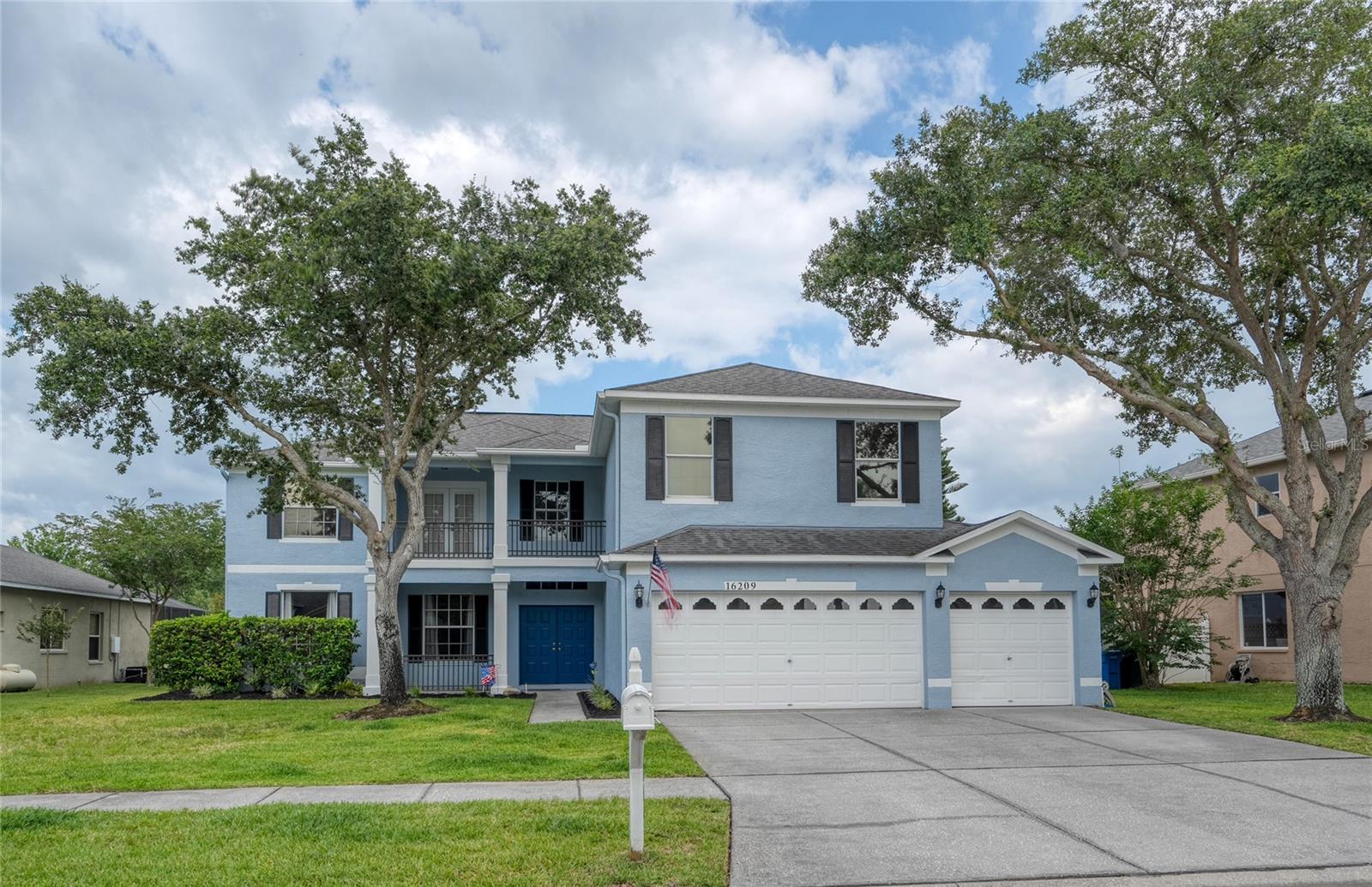 Nestled on a quiet street, this home has HURRICANE RATED DOORS & WINDOWS