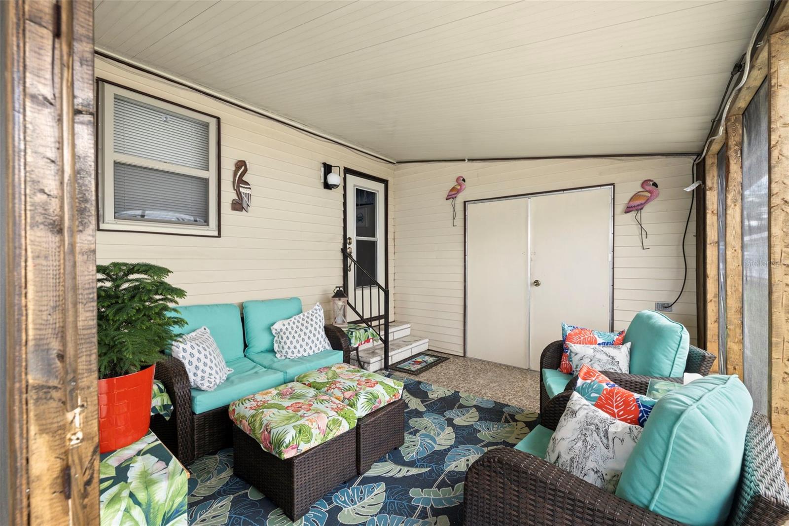 Screened-in patio right off the carport!  Perfect place for your morning coffee!