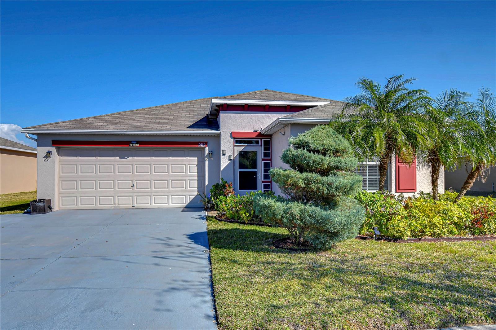 Charming home with lush landscaping awaits!