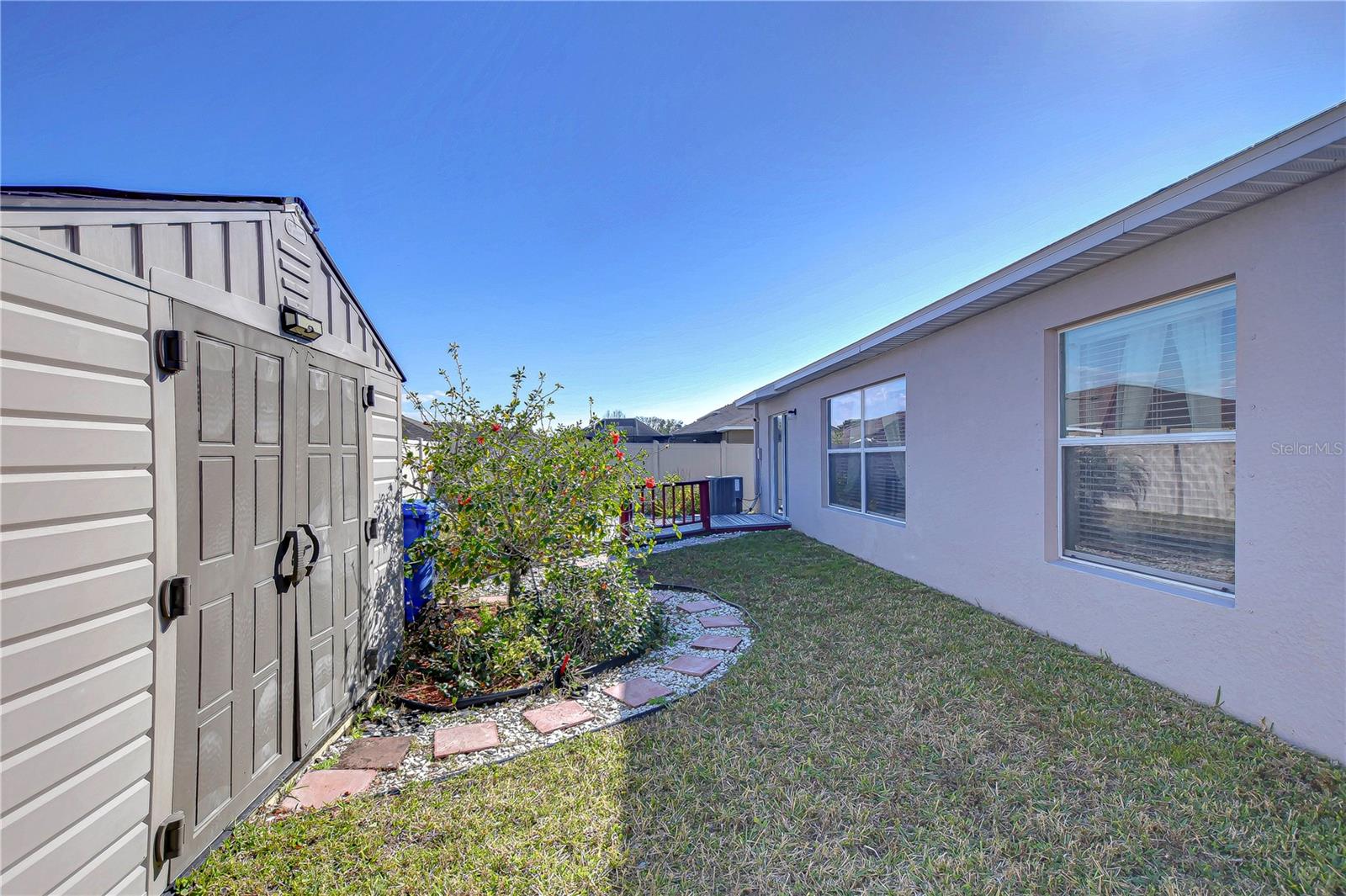 Backyard has extra storage space.