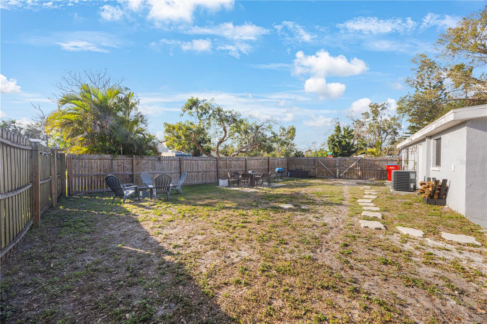 HUGE backyard with room for a pool and still have green space