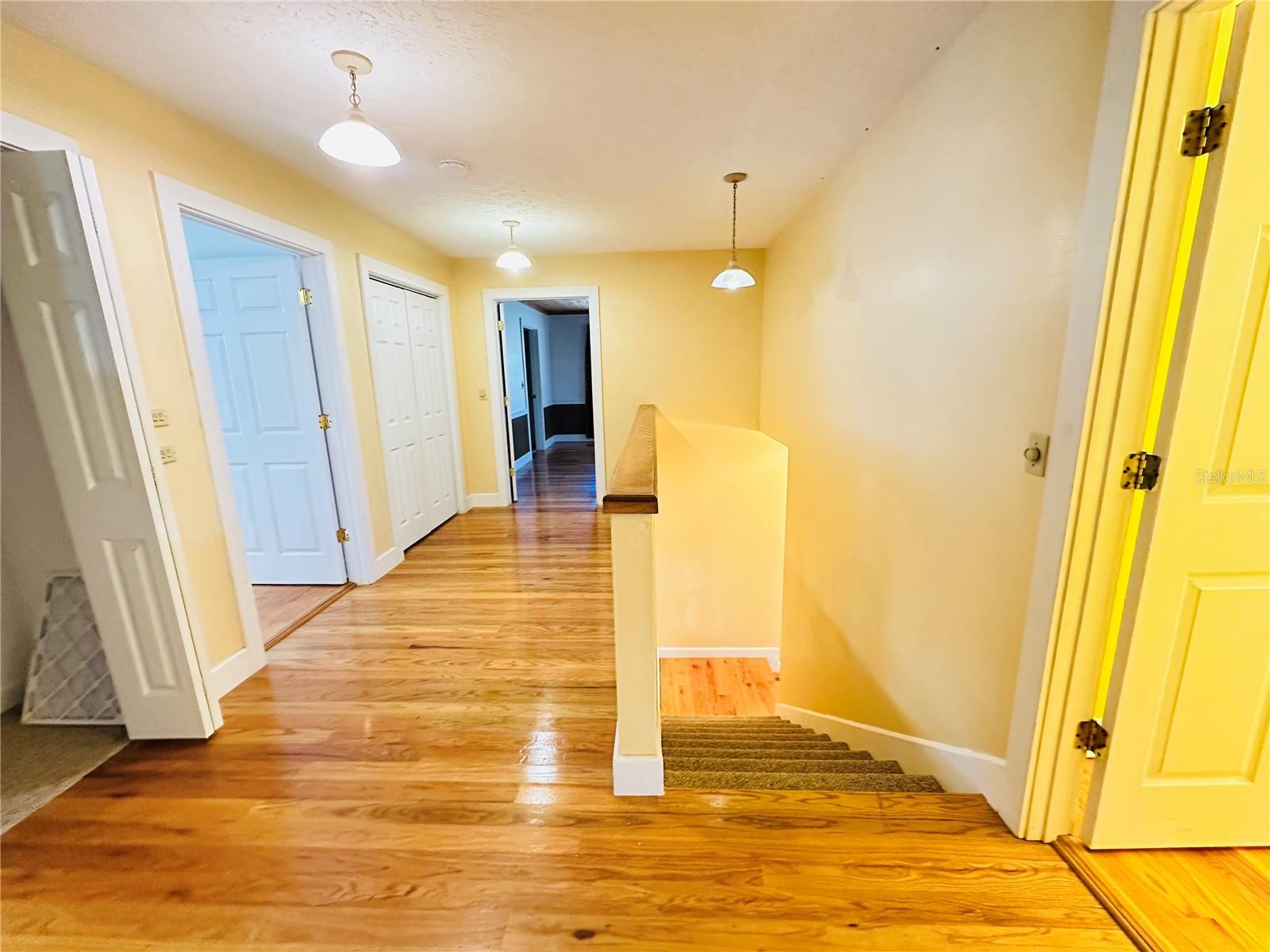 Top of the stairs, Hallway with storage closets