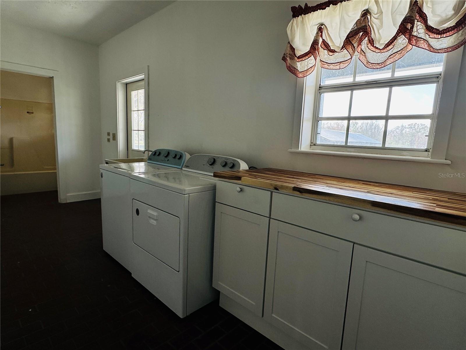 Laundry Room with 3rd full bathroom