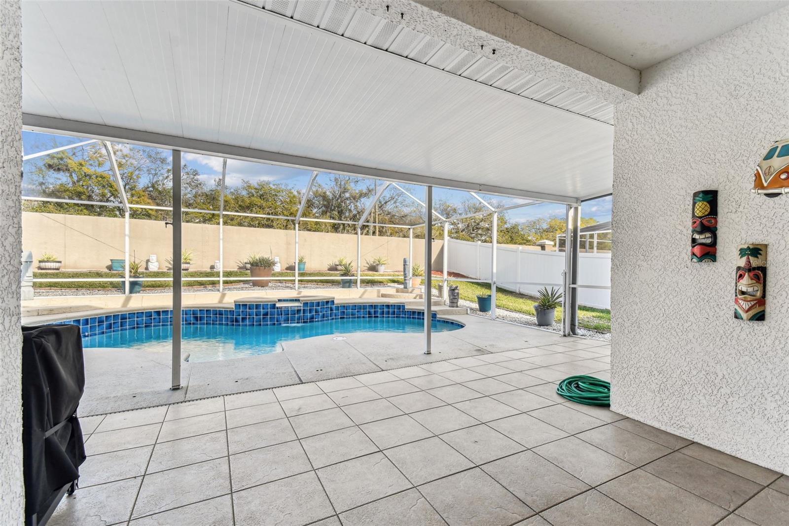 Step outside to a large covered space, Perfect for your patio furniture.