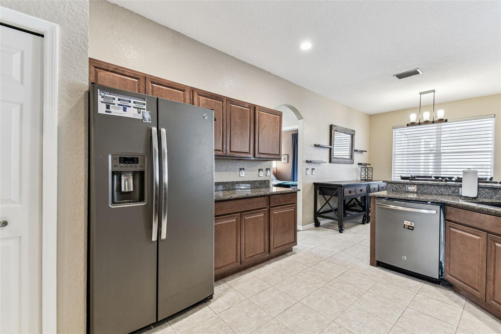 Kitchen with energy efficient staniless appliances.