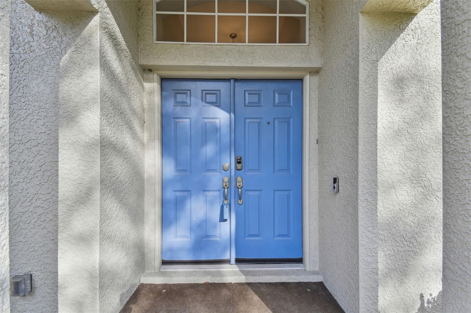 Inviting double front doors.