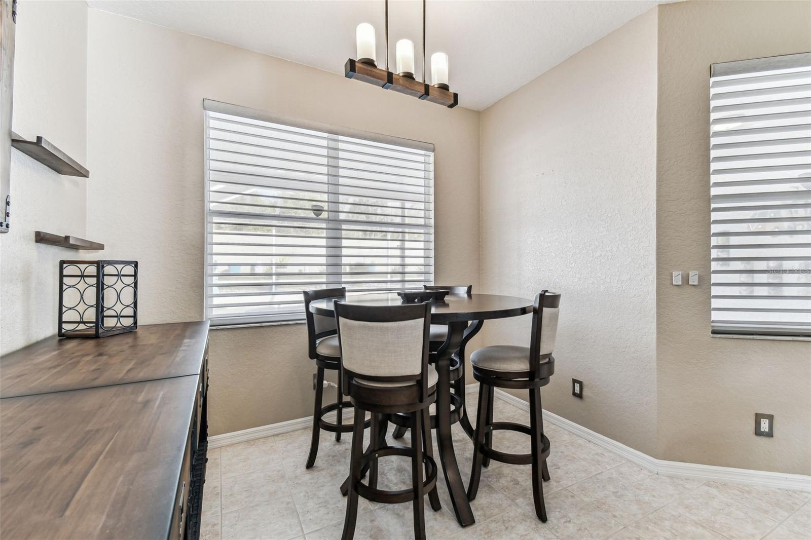 Cozy breakfast nook with views to the pool.