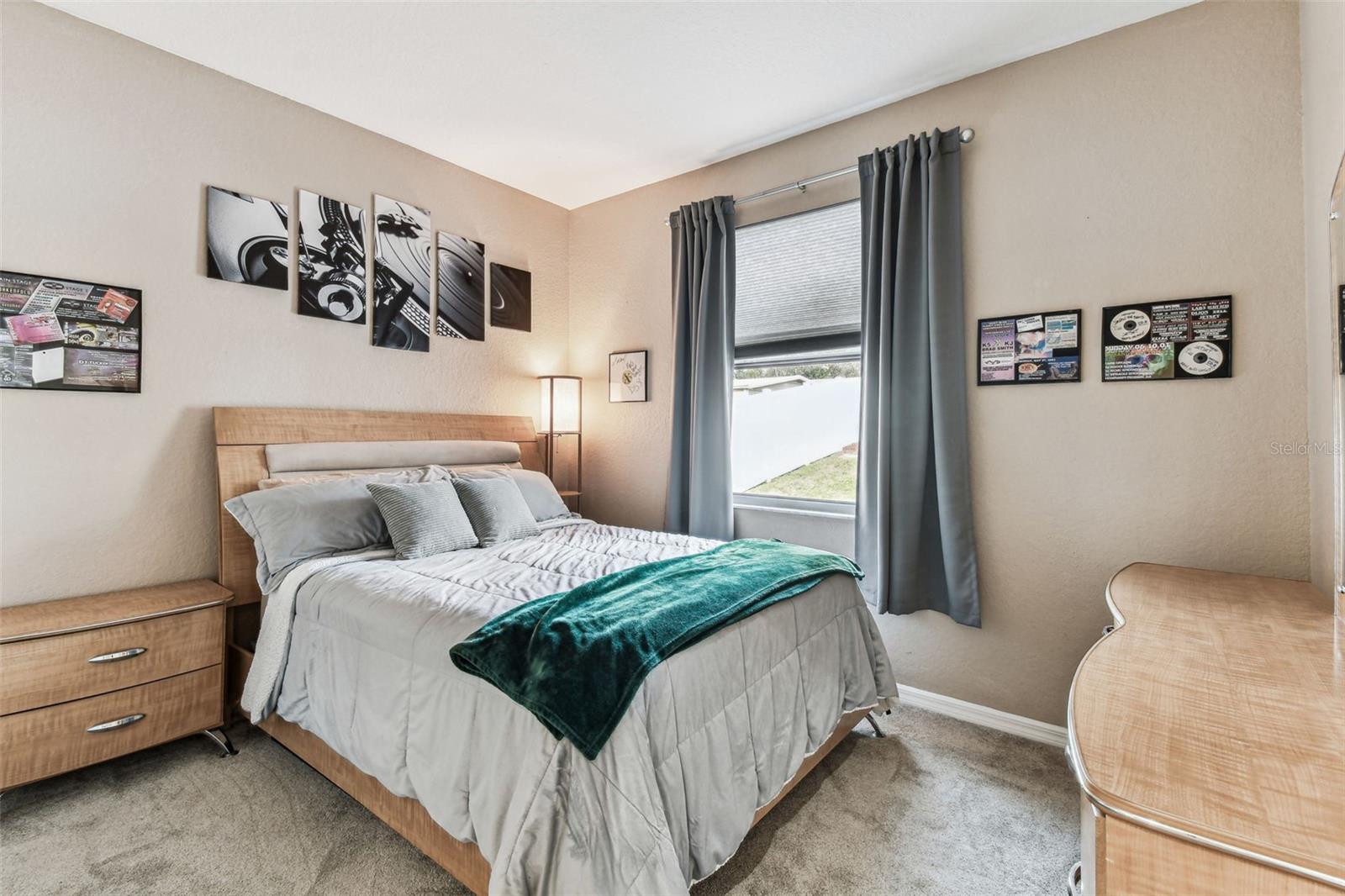 Secondary bedroom with queen bed and still plenty of room.