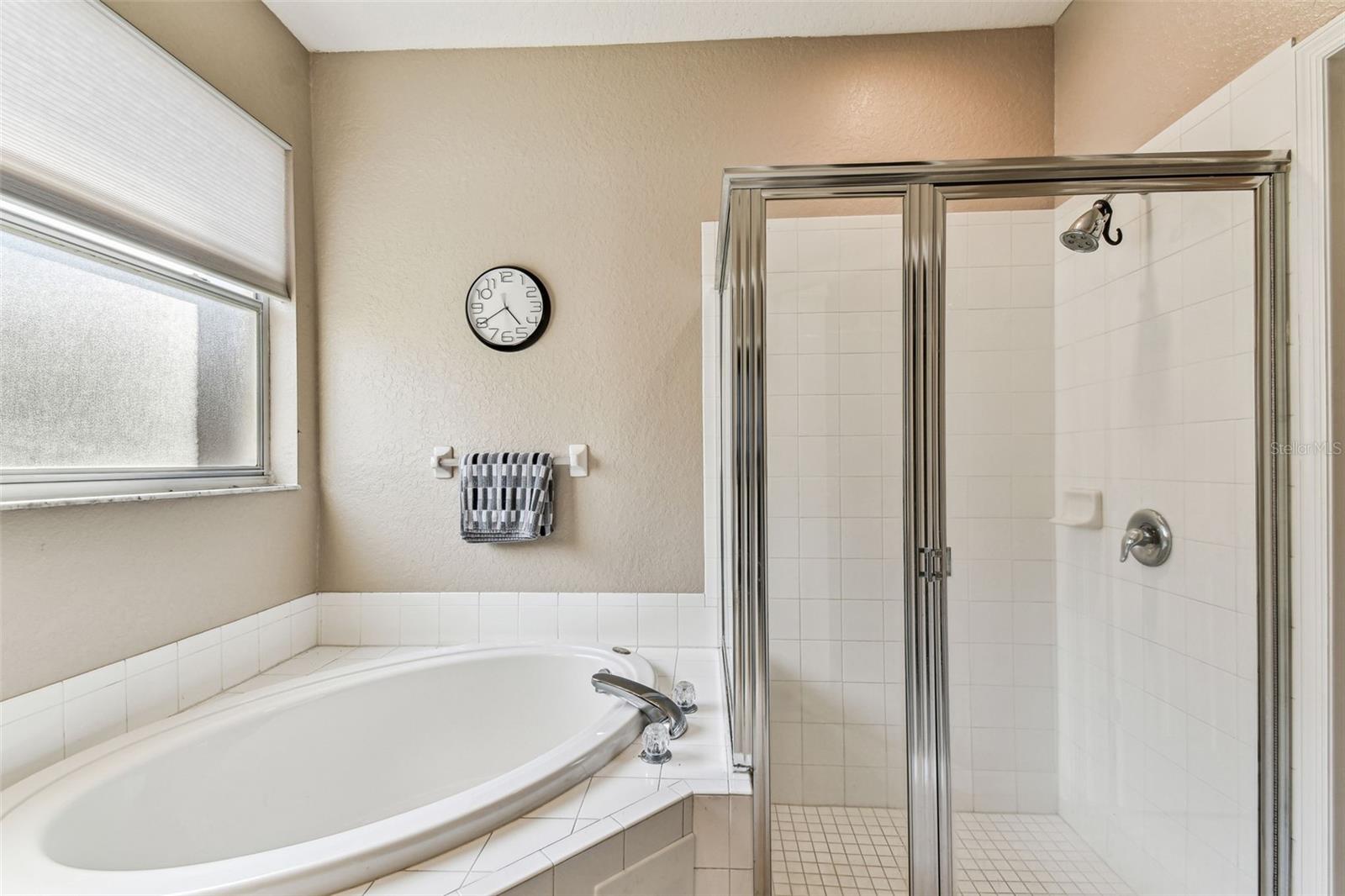 Shower and garden tub combo.