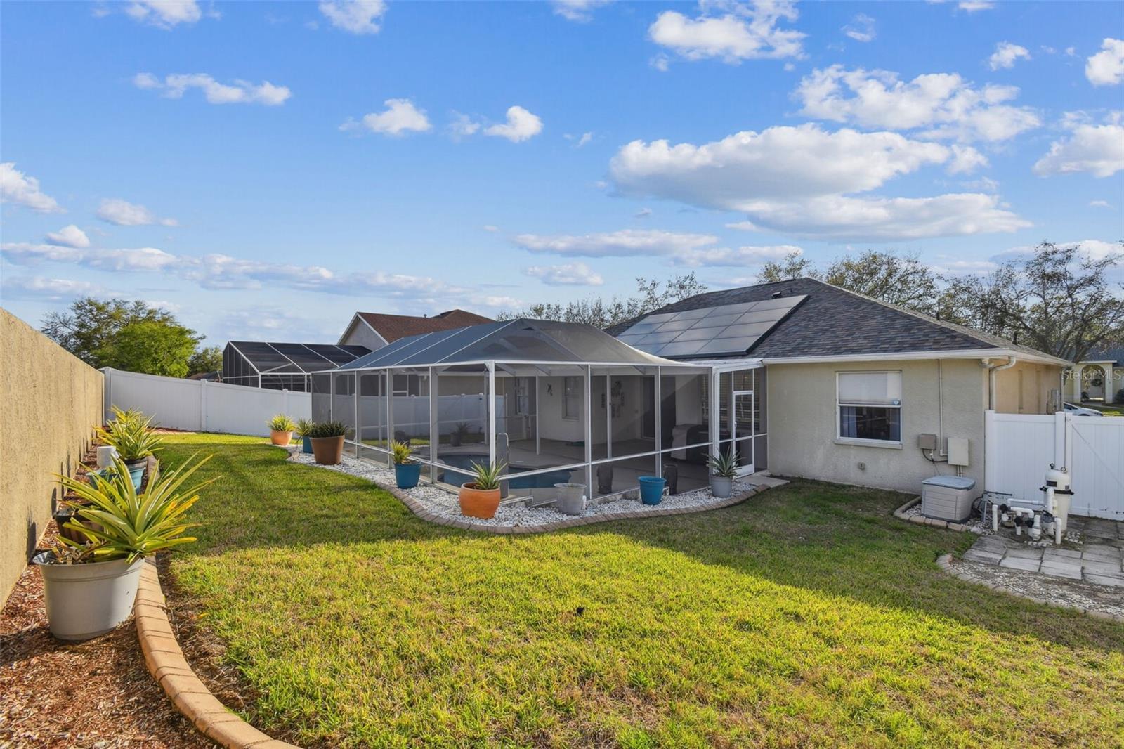 Enjoy your pool and a large yard!