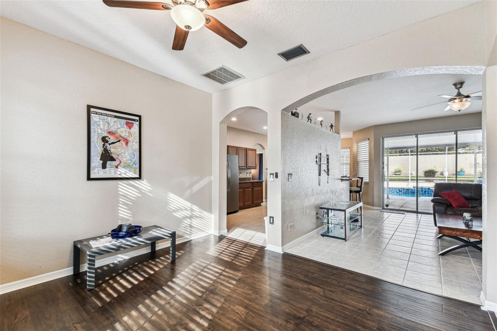 Easy access to the kitchen and great view of the pool.