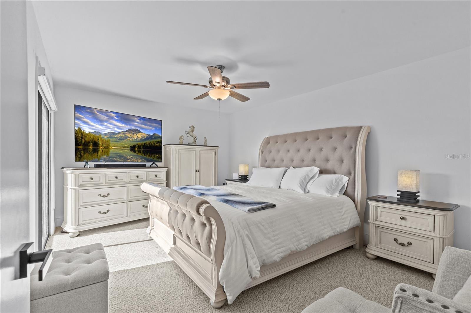 Primary Bedroom with Sliding Glass Doors and Balcony