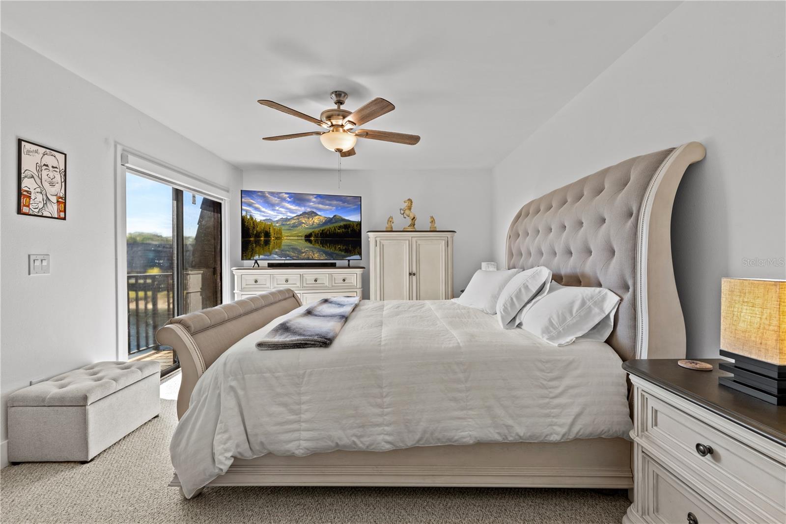 Primary Bedroom with Sliding Glass Doors and Balcony