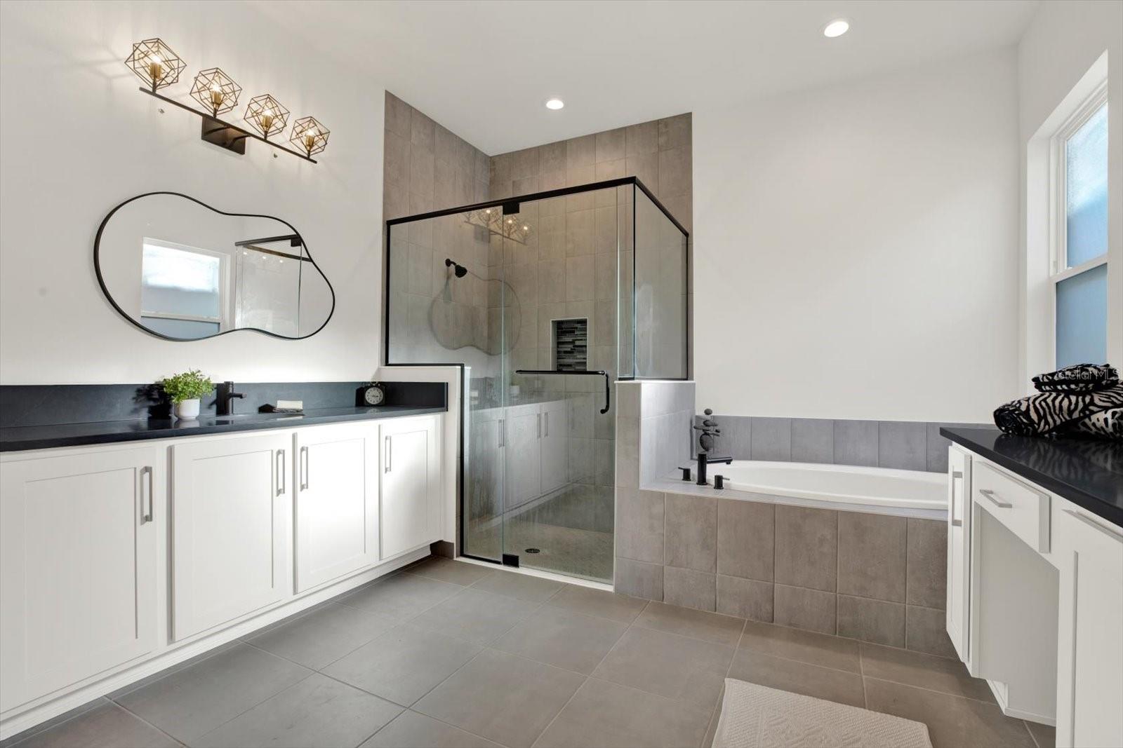 Primary bathroom with dual vanities