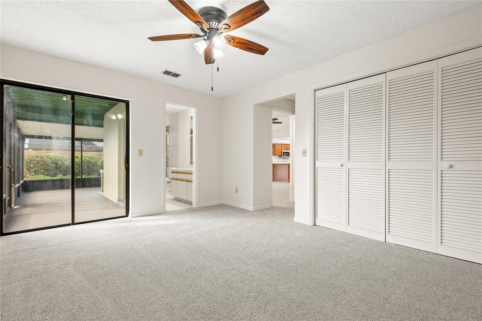 3rd Bedroom with en suite bathroom and entry to lanai