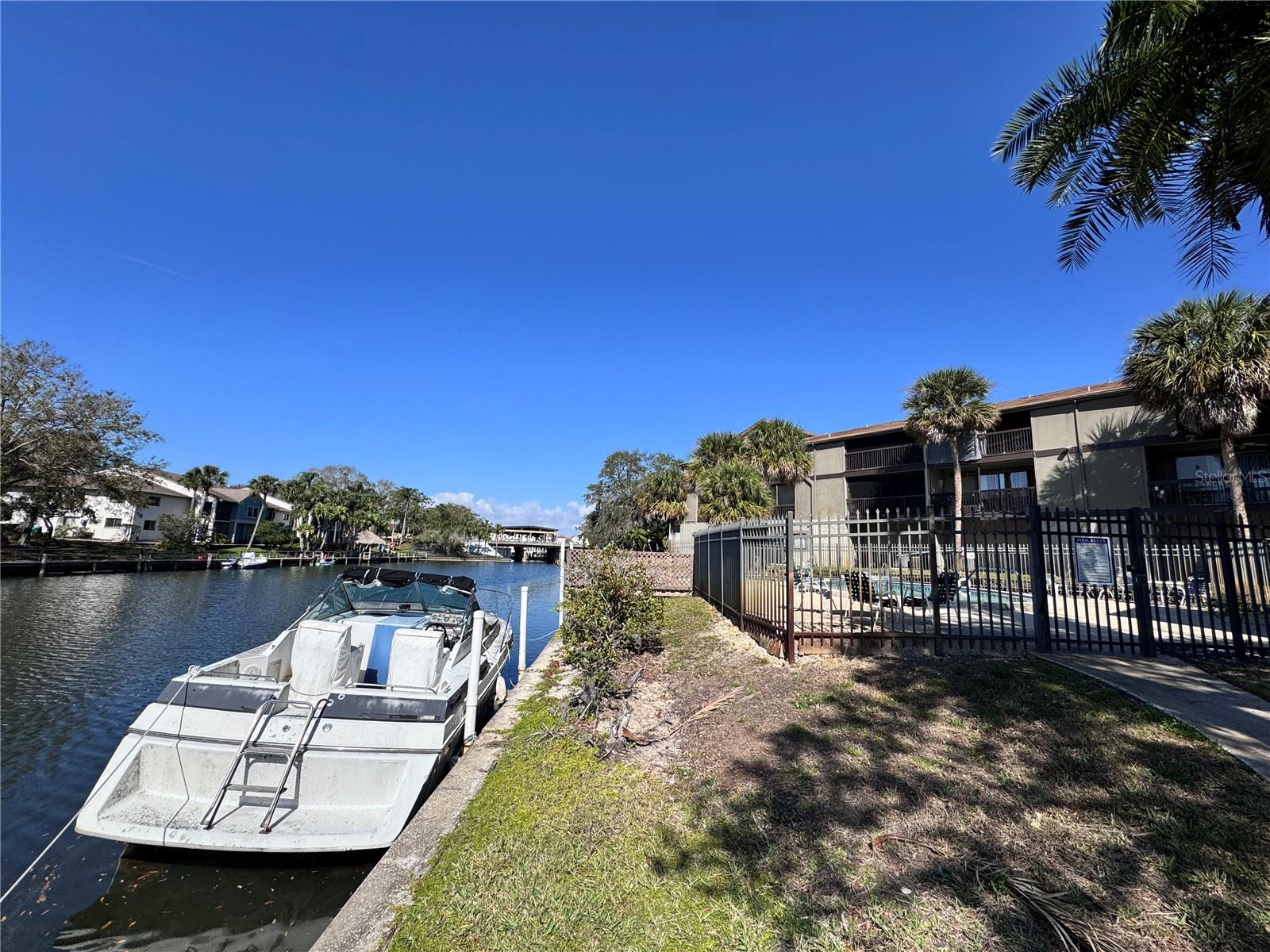 Enjoy access to a boat ramp, boat lift, boat parking, tennis courts, a scenic waterfront walking path, four pools, and an adult-only clubhouse with a pool table providing endless entertainment.