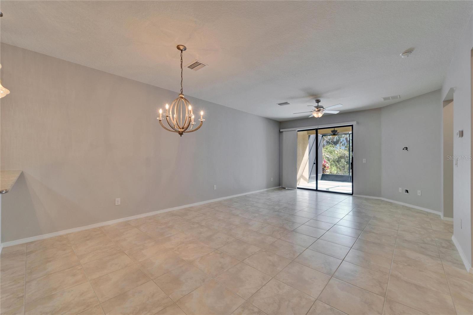 Greatroom/diningroom and sliders to the extended lanai.