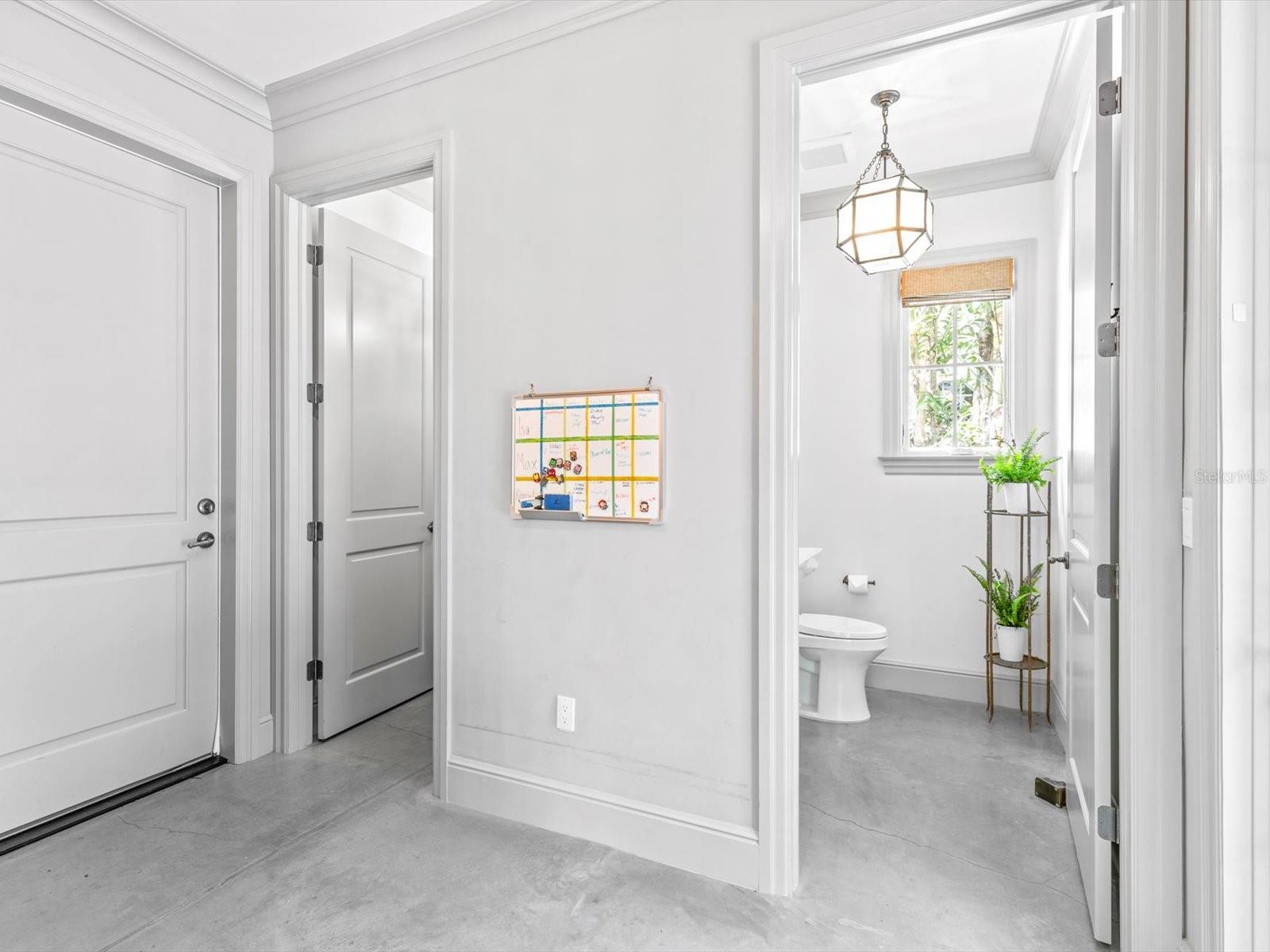 1st floor laundry room and downstairs poolbath