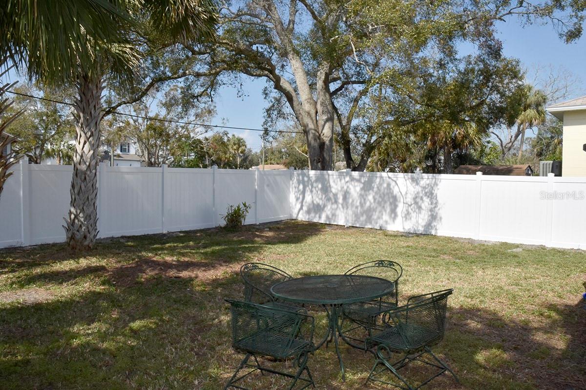 Brand new privacy fence surrounds the back and side yards.