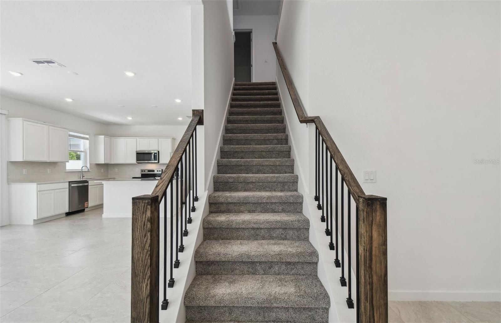 Iron Balusters with Oak Handrail Staircase