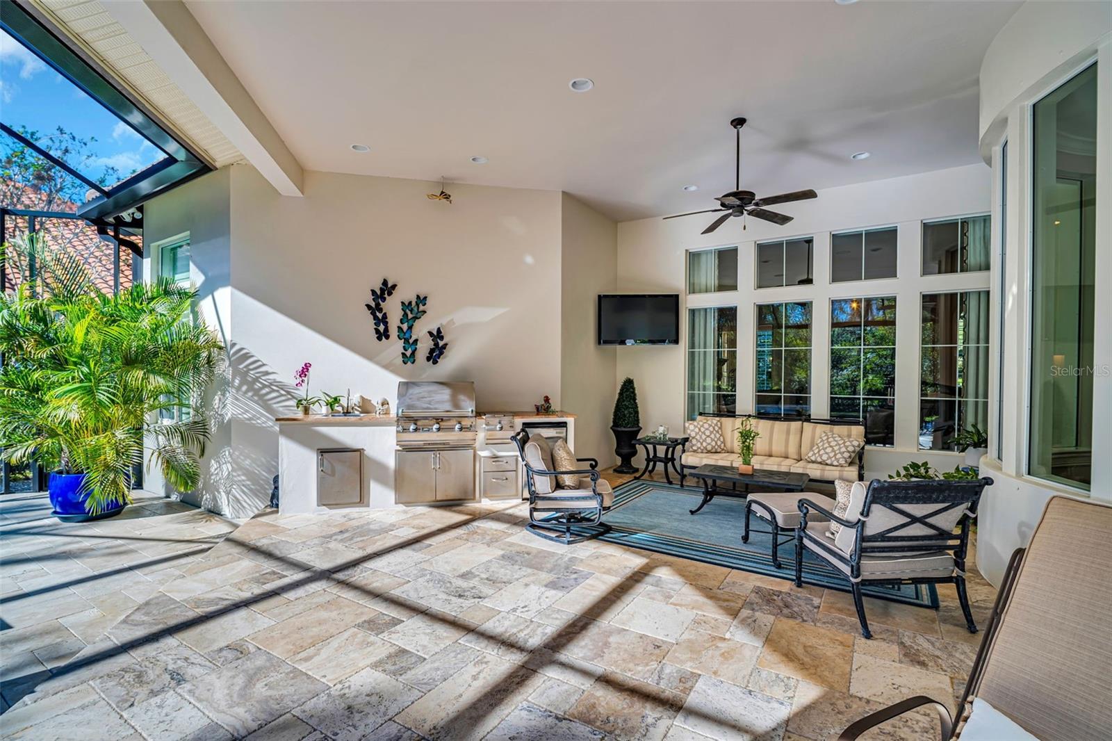 Patio with outdoor kitchen and built in gas grill