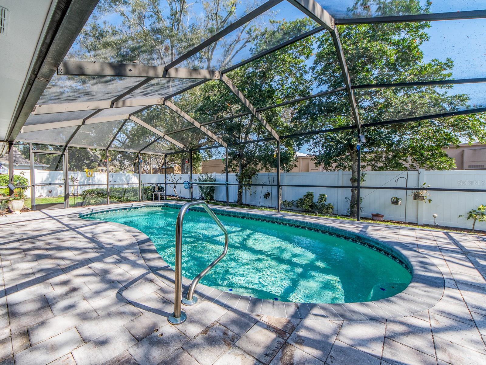 SCREENED POOL WITH NEW PAVERED POOL DECK