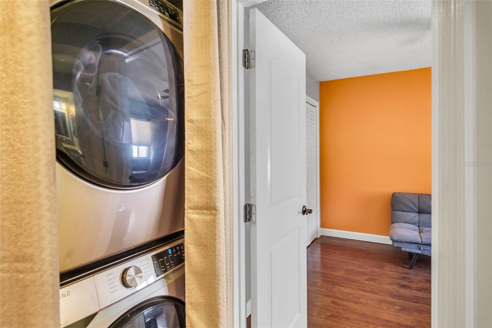 Laundry closet heading toward guest bedroom