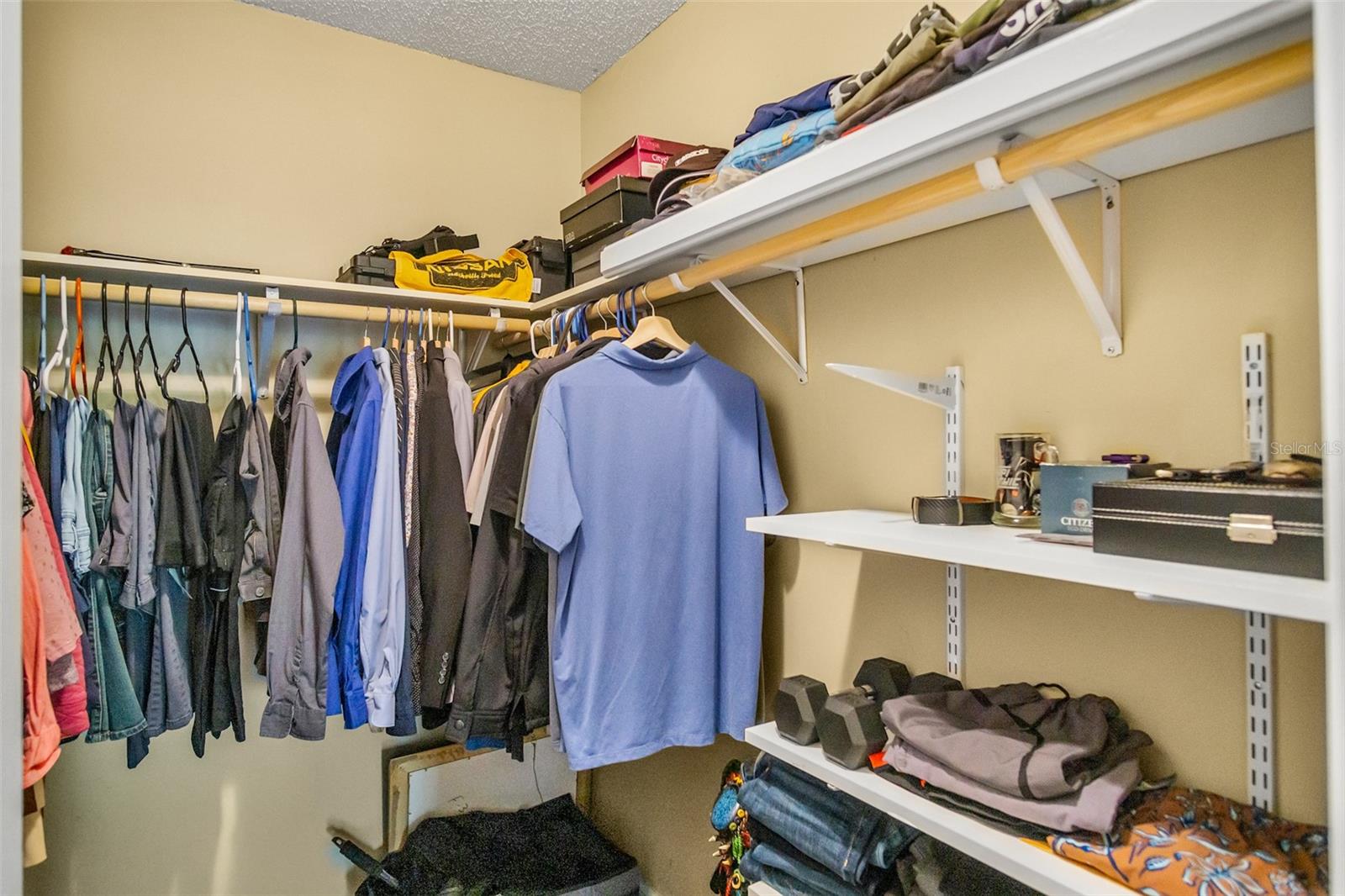 Walk-in closet in primary bedroom