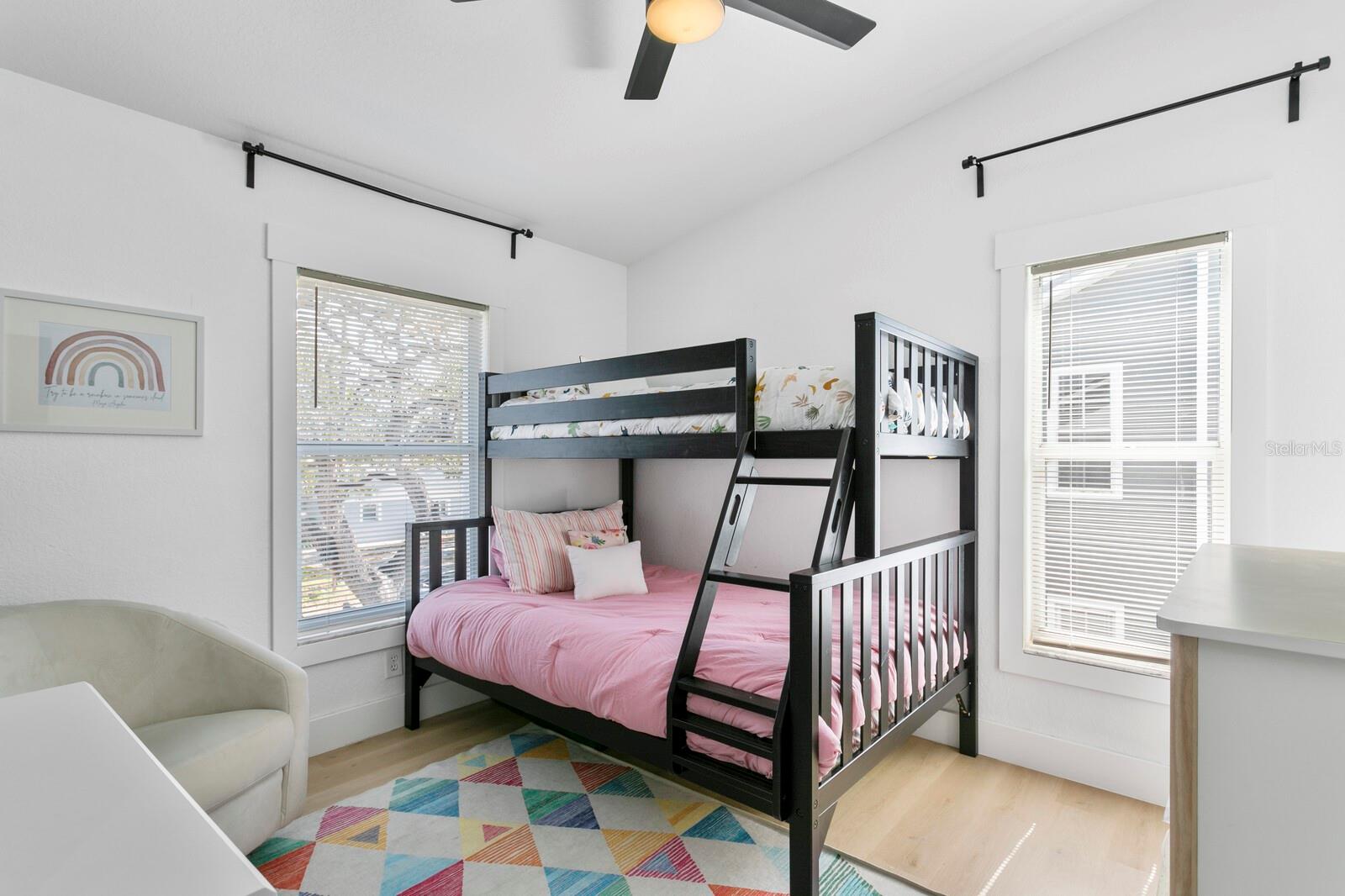 The 3rd bedroom has great light and a ceiling fan